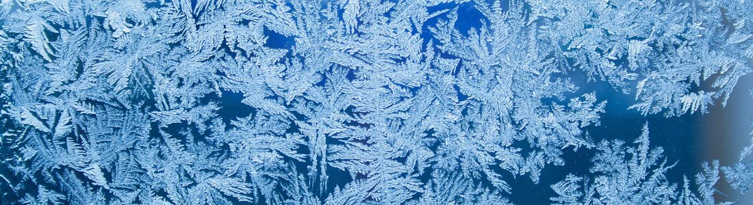 Ice crystals on window in cold weather