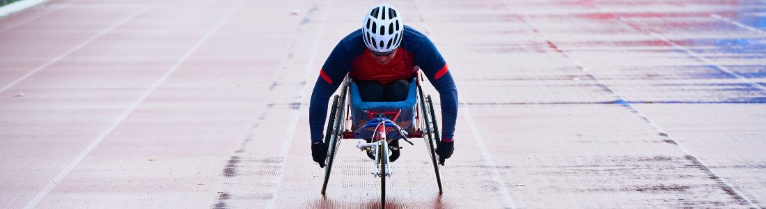 Man in sports wheelchair participating in disabled sport