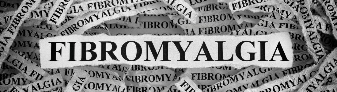 The word Fibromyalgia torn from newspaper